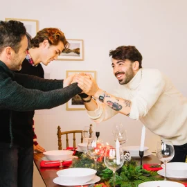 Young Family Having Christmas Dinner